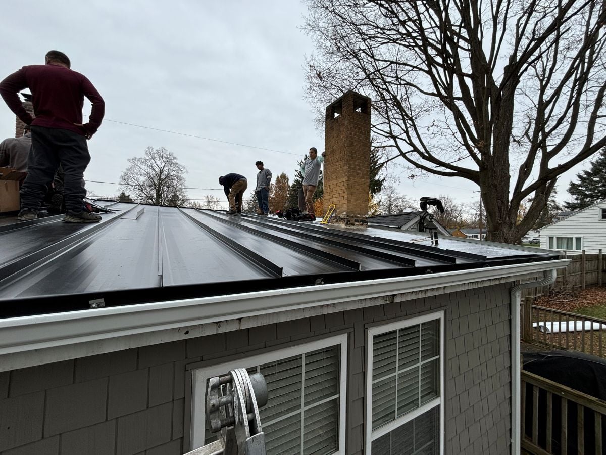 Dice team working on a roof