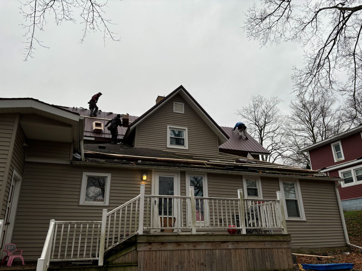 A roof being worked on by Dice Roofing Solutions