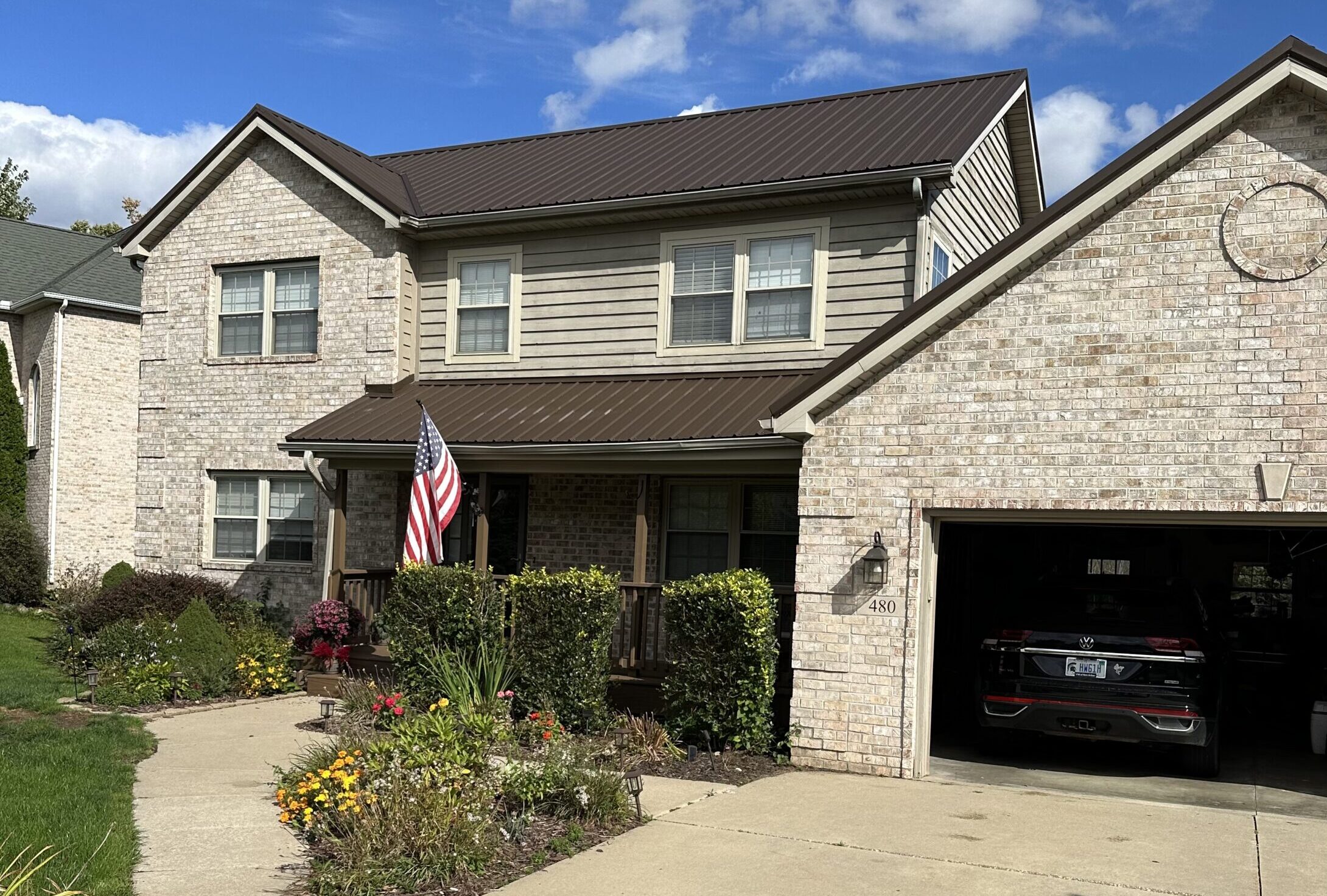a house with a new metal roof