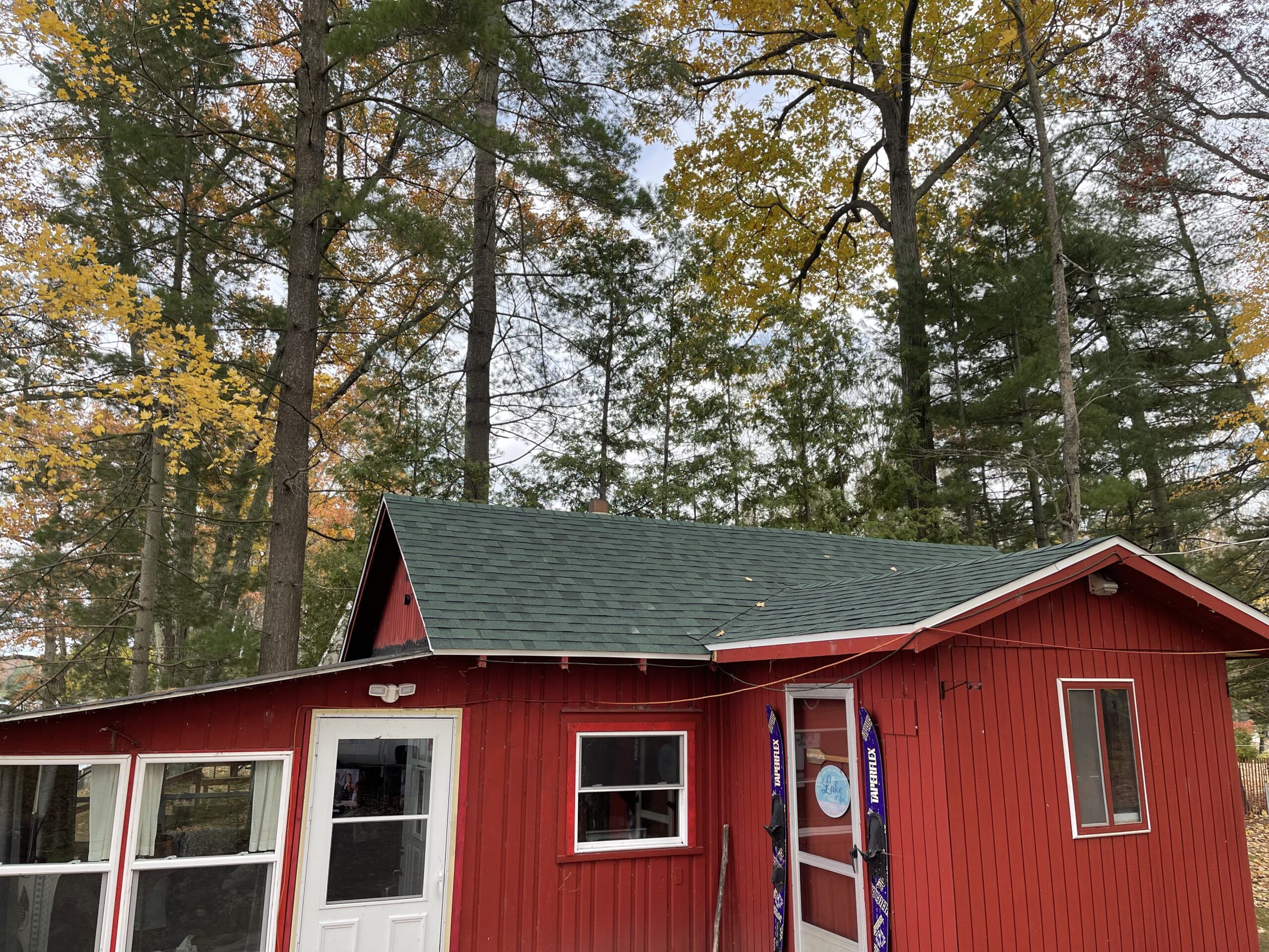 a red house with a new roof