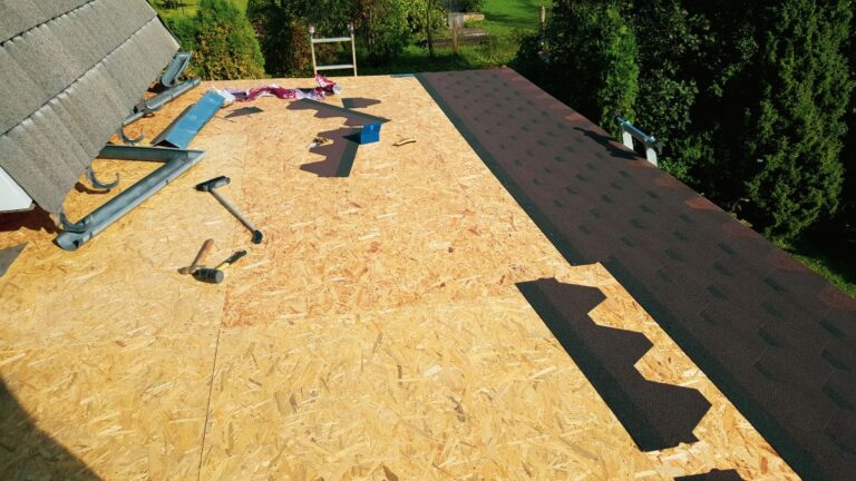 roof being replaced with new shingles